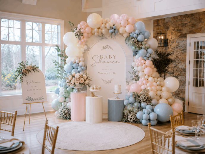 Baby shower decoration in Bucks County with balloon arch and custom backdrop
